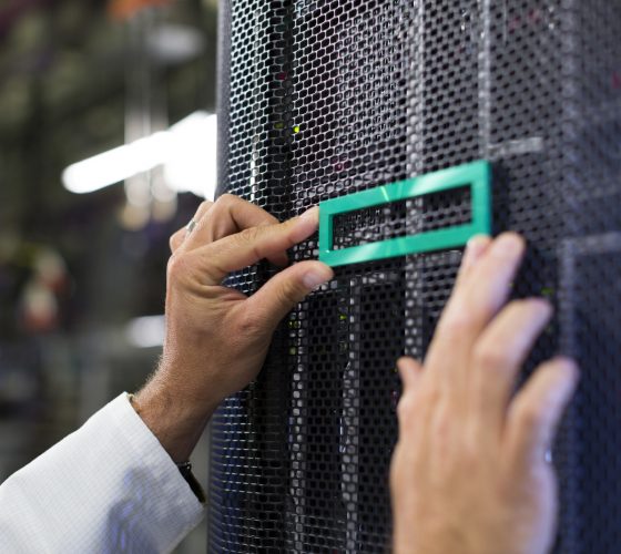 Man working in computer server room